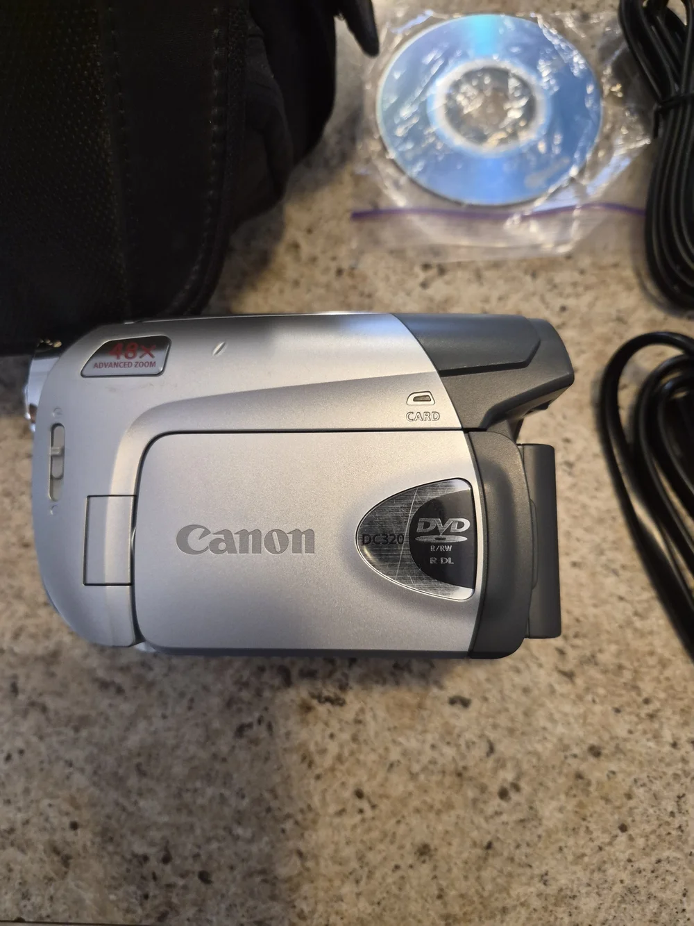 Canon Model # DC-320 Silver DVD Camcorder with Accessories